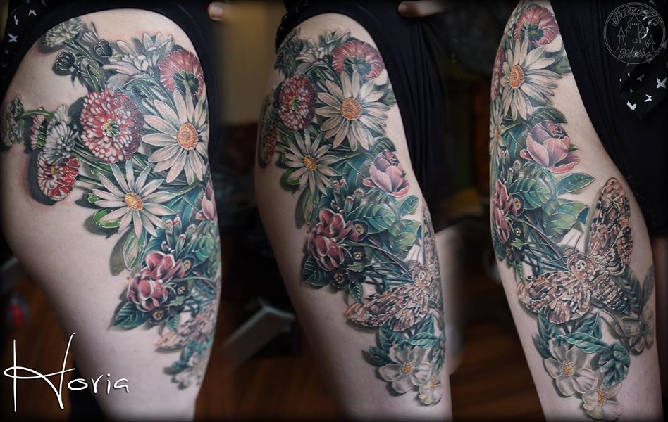 ArtCastleTattoo Tattoo ArtiestHoria Color realism flowers with moth tattoo upper leg healed Color