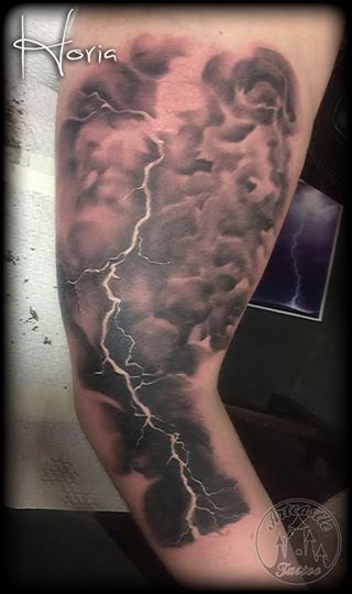 ArtCastleTattoo Tattoo ArtiestHoria Realistic Lightning Bolt black n grey on arm Black n Grey