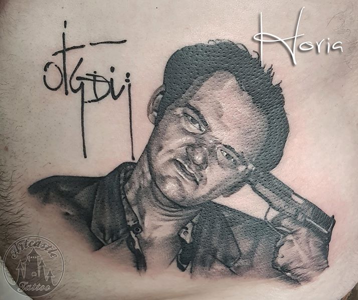 ArtCastleTattoo Tattoo ArtiestHoria Realistic Quentin Tarantino portrait tattoo in black n grey on side Portraits