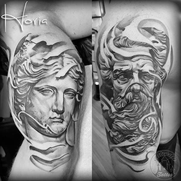 ArtCastleTattoo Tattoo ArtiestHoria Realistic greek statue faces black n grey upper arm Black n Grey