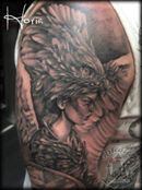 ArtCastleTattoo Tattoo ArtiestHoria Womans portrait with bird head dress black n grey realistic black n grey tattoo Black n Grey