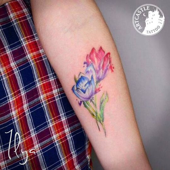 ArtCastleTattoo Tattoo ArtiestIlya Watercolour flowers on arm Color