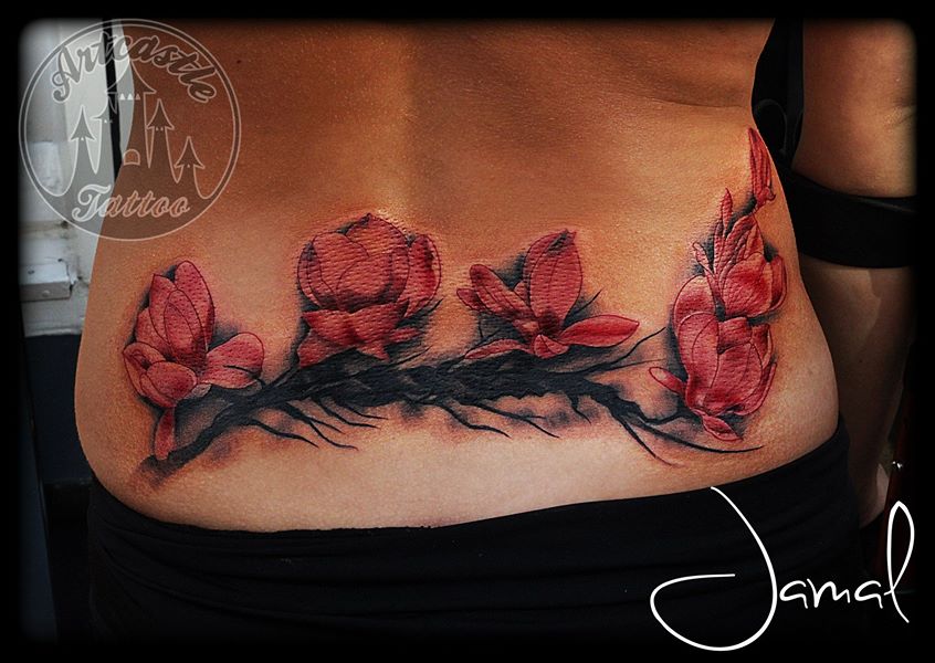 ArtCastleTattoo Tattoo ArtiestJamal Color Blossom tattoo lower back Kleur blossom tattoo onderrug Color
