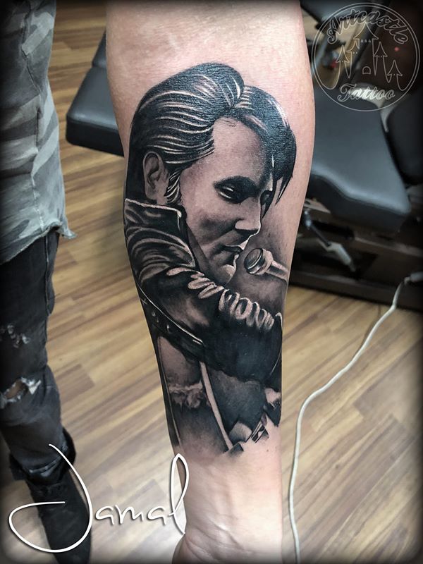 ArtCastleTattoo Tattoo ArtiestJamal Realistic Black n Grey portrait of Elvis Presley with guitar lower arm Portraits