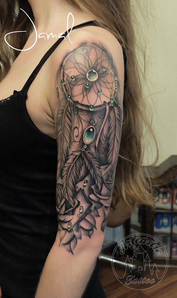 ArtCastleTattoo Tattoo ArtiestJamal Realistic Dreamcatcher half sleeve with roses and emerald stones. Black n Grey