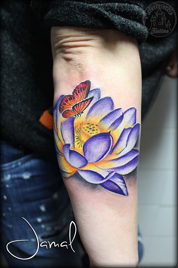 ArtCastleTattoo Tattoo ArtiestJamal Vibrant purple lotus that wraps around the arm with butterfly Color