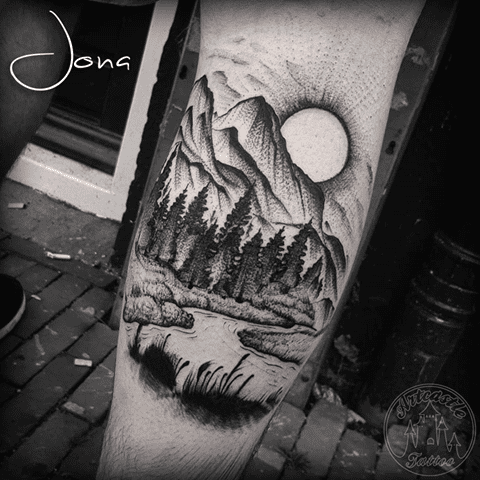 ArtCastleTattoo Tattoo ArtiestJona Blackwork landscape tattoo with rising sun and trees on leg Blackwork
