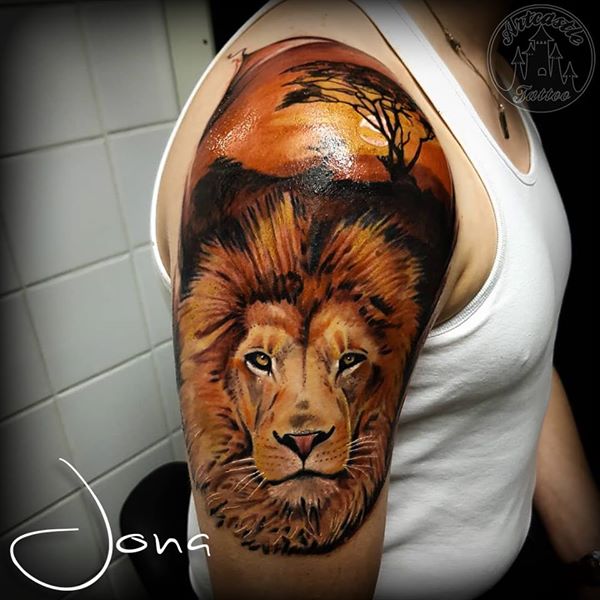 ArtCastleTattoo Tattoo ArtiestJona Color lion on upper arm. Realisme Realism