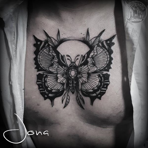 ArtCastleTattoo Tattoo ArtiestJona Jewel butterfly tattoo on chest in blackwork Blackwork