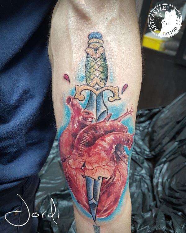ArtCastleTattoo Tattoo ArtiestJordi Knife through heart on arm Color