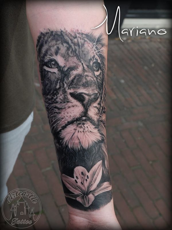 ArtCastleTattoo Tattoo ArtiestMariano Realistic Lion with lily tattoo underarm Black n Grey
