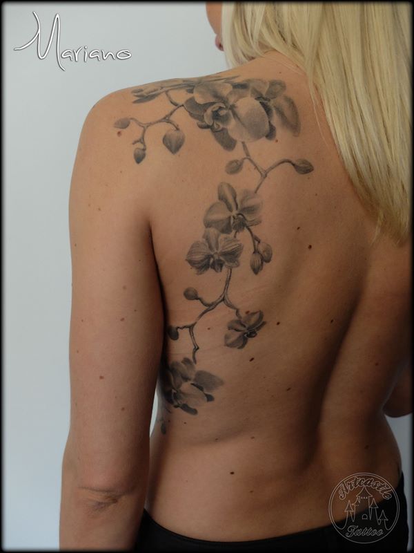 ArtCastleTattoo Tattoo ArtiestMariano Realistic Orchid flowers on back shoulder Black n Grey