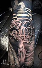 ArtCastleTattoo Tattoo ArtiestMariano Realistic candle elbow piece on a full sleeve BlacknGrey