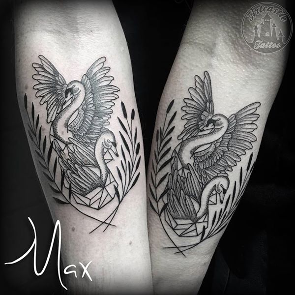 ArtCastleTattoo Tattoo ArtiestMax Matching couple swan tattoos with geometric dotwork and blackwork elements on lower arm Dotwork