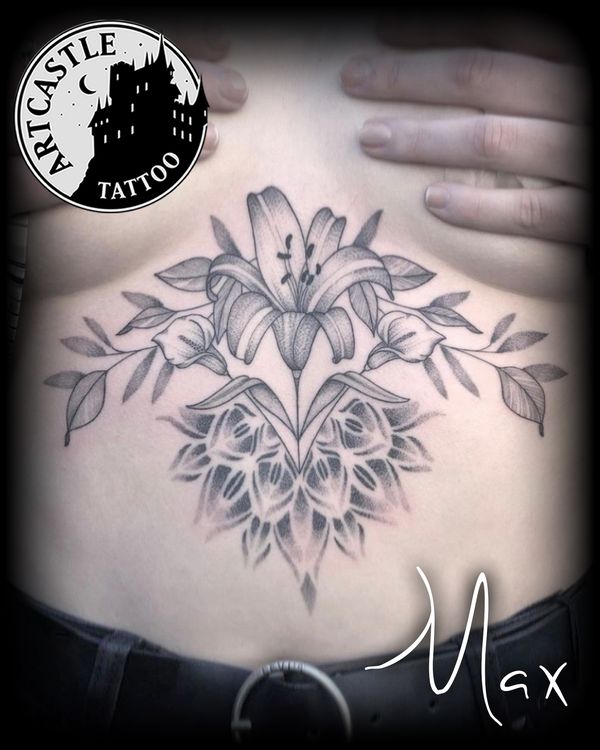ArtCastleTattoo Tattoo ArtiestMax lily with leaves and mandala on sternum. Blackwork