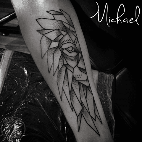 ArtCastleTattoo Tattoo ArtiestMichael Geometric lion tattoo black n grey dotwork on lower arm Geometric