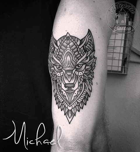 ArtCastleTattoo Tattoo ArtiestMichael Geometric mandala Wolf tattoo on arm black n grey Geometric