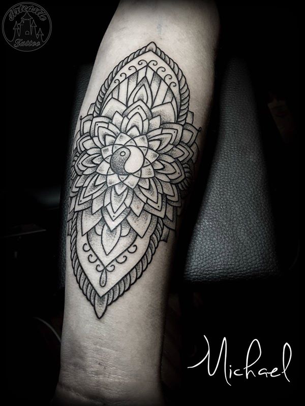 ArtCastleTattoo Tattoo ArtiestMichael Mandala with clean lines and light shading with a Yin Yang at the center Mother has the other half of the Yin Yang Mandala