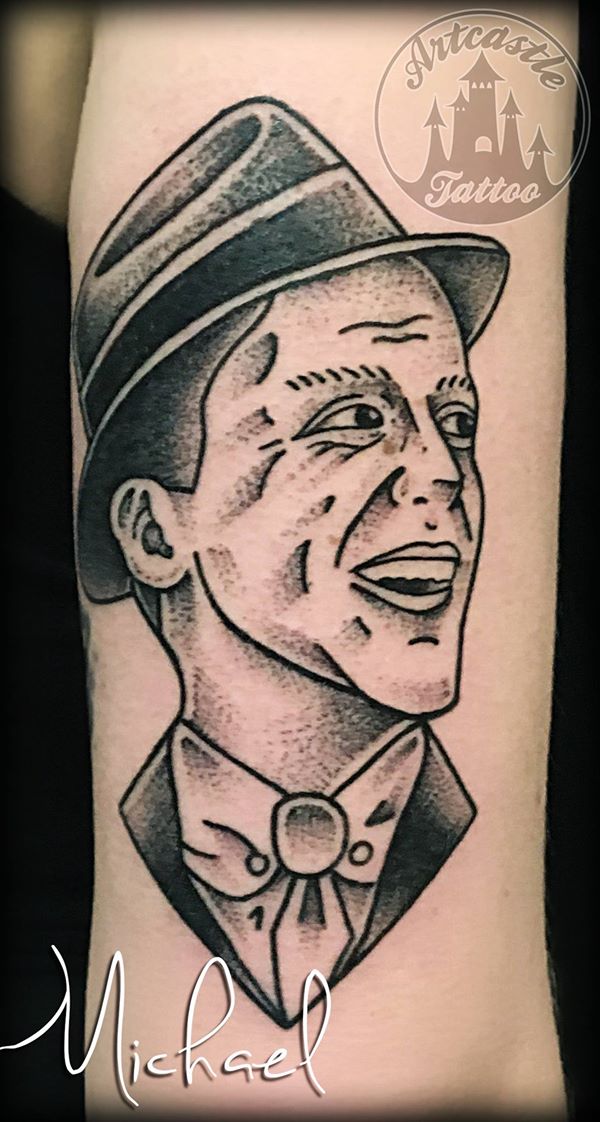 ArtCastleTattoo Tattoo ArtiestMichael Traditional Portrait of Frank Sinatra tattoo black n grey on arm Traditioneel portret op Frank Sinatra tattoo black and grey op arm Old School