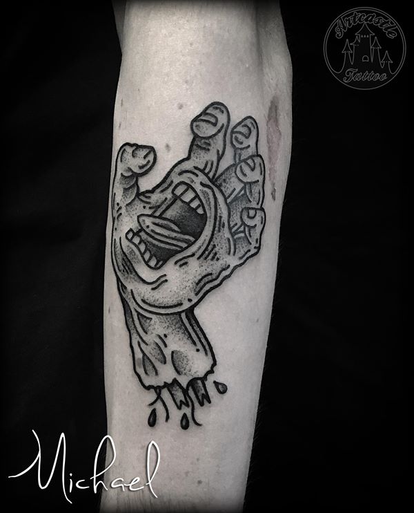 ArtCastleTattoo Tattoo ArtiestMichael Traditional Zombie hand black n grey on lower arm Old School