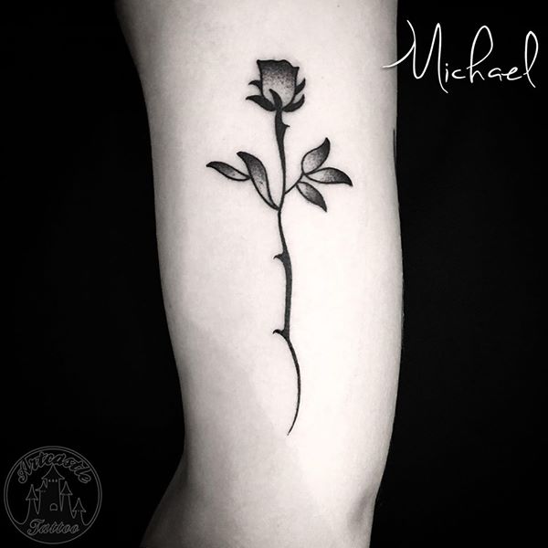 ArtCastleTattoo Tattoo ArtiestMichael blackwork minimalistic rose tattoo black n grey on arm Blackwork