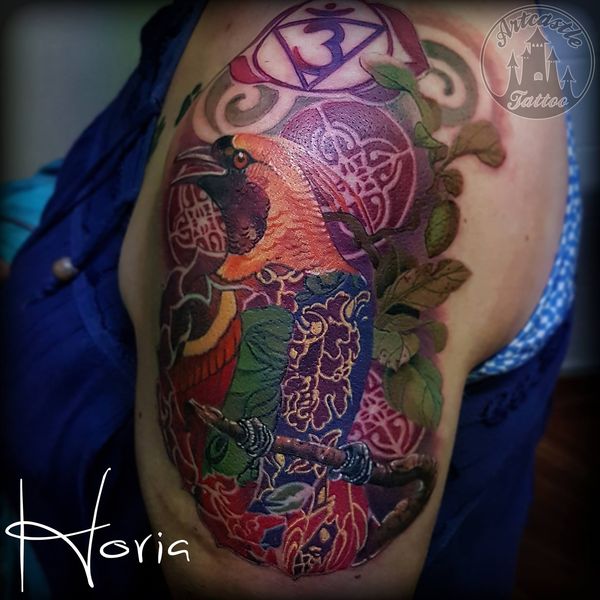 ArtCastleTattoo Tattoo ArtiestPrive Horia Paradise bird tattoo in full color upper arm Color