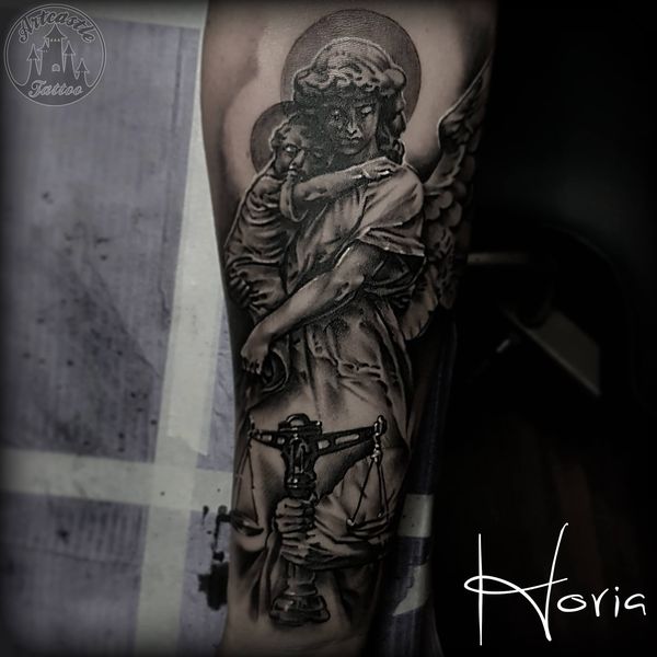 ArtCastleTattoo Tattoo ArtiestPrive Horia Realistic Angel with child tattoo lower arm Black n Grey