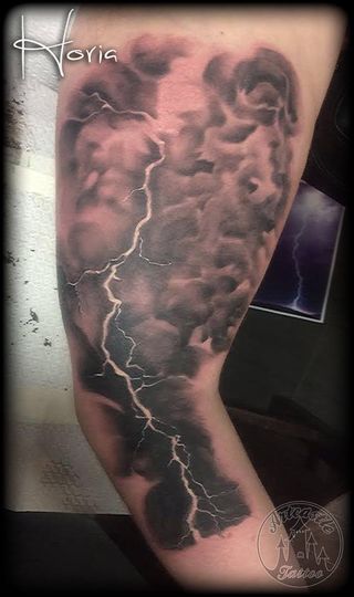 ArtCastleTattoo Tattoo ArtiestPrive Horia Realistic Lightning Bolt black n grey on arm Black n Grey
