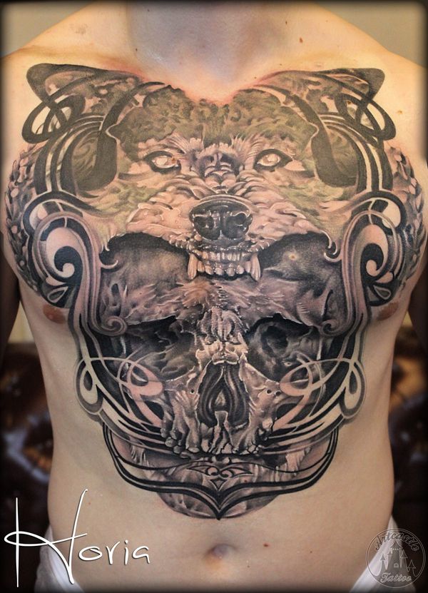 ArtCastleTattoo Tattoo ArtiestPrive Horia Realistic Skull and wolf tattoo chestpiece Black n Grey