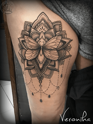 ArtCastleTattoo Tattoo ArtiestVeronika Black n grey mandala with butterfly and lots of details on upper leg Mandala