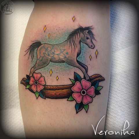 ArtCastleTattoo Tattoo ArtiestVeronika Rocking horse with flowers in full color Neo Traditional