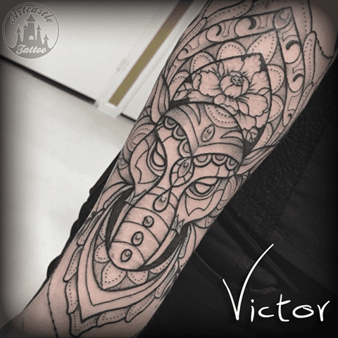 ArtCastleTattoo Tattoo ArtiestVictor Elephant with flowers geomtrisch tattoo lowerarm Neo Traditioneel Neo Traditional