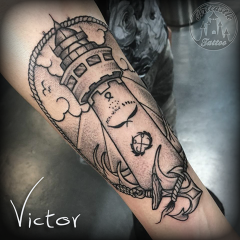 ArtCastleTattoo Tattoo ArtiestVictor Lighthouse anchor tattoo lower arm Traditioneel Traditional