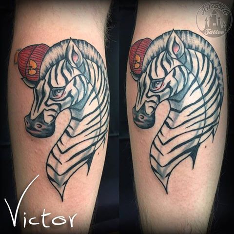 ArtCastleTattoo Tattoo ArtiestVictor Zebra tattoo with a Wu Tang hat Kleur Color