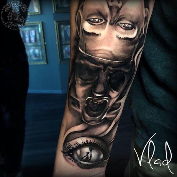 ArtCastleTattoo Tattoo ArtiestVlad Realistic Eye face morph tattoo lower arm Black n Grey
